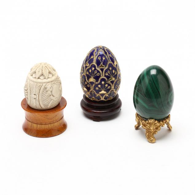 three-decorative-eggs-on-stands