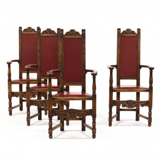 set-of-four-spanish-renaissance-style-carved-oak-and-leather-arm-chairs
