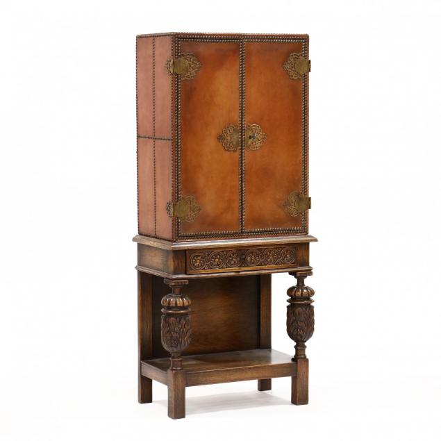 jacobean-style-leather-wrapped-cabinet-on-stand