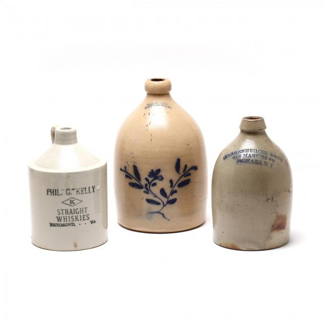 three-vintage-whisky-advertising-jugs