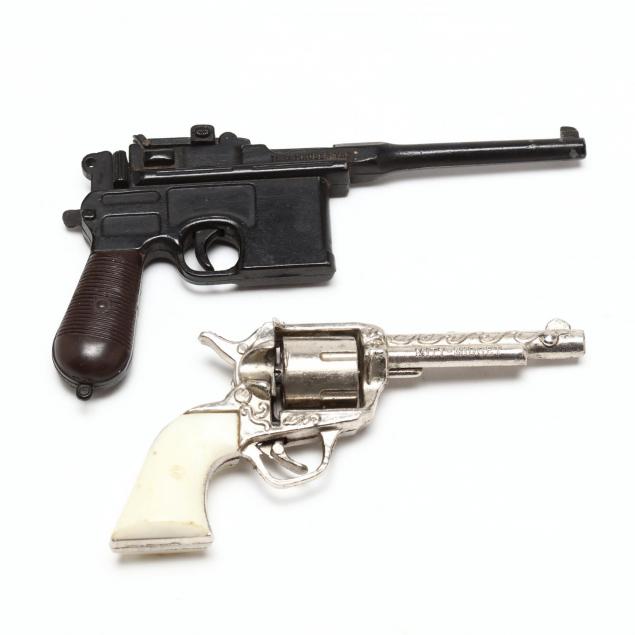 two-vintage-miniature-cap-guns