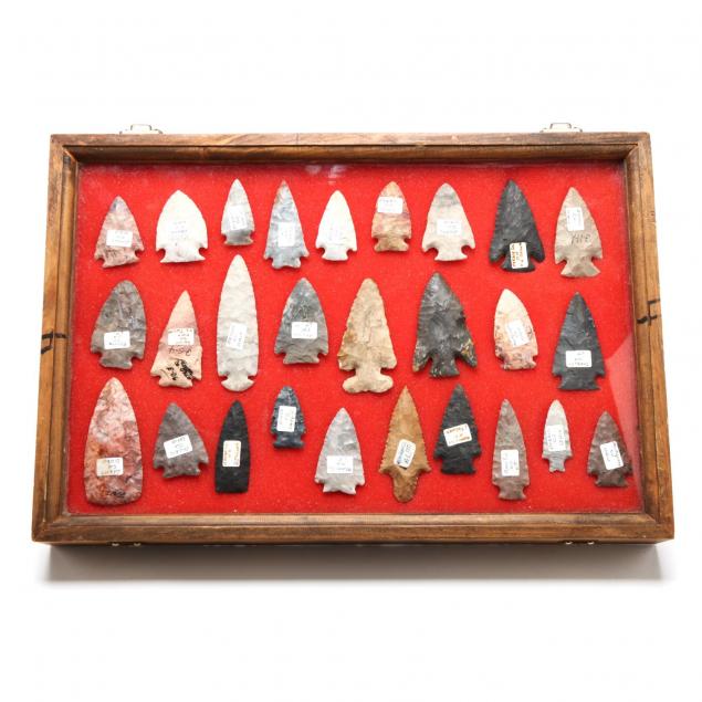 frame-of-27-archaic-projectile-points-from-the-lawrence-tolliver-collection