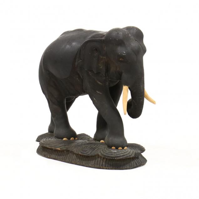 large-antique-carved-wood-elephant