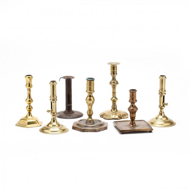 group-of-antique-brass-candlesticks