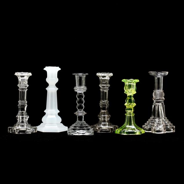 six-antique-glass-candlesticks