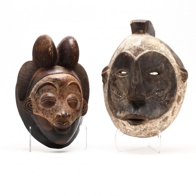 two-vintage-carved-wood-african-masks
