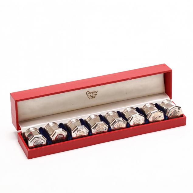 a-set-of-eight-sterling-silver-shakers-by-cartier