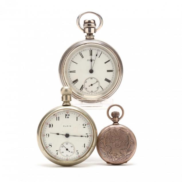 three-antique-pocket-watches