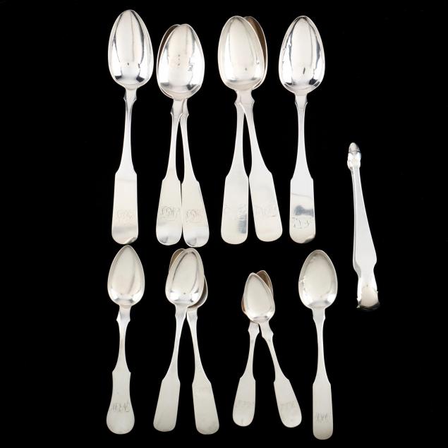 a-group-of-md-coin-silver-flatware
