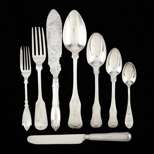 a-group-of-ornate-american-coin-silver-flatware