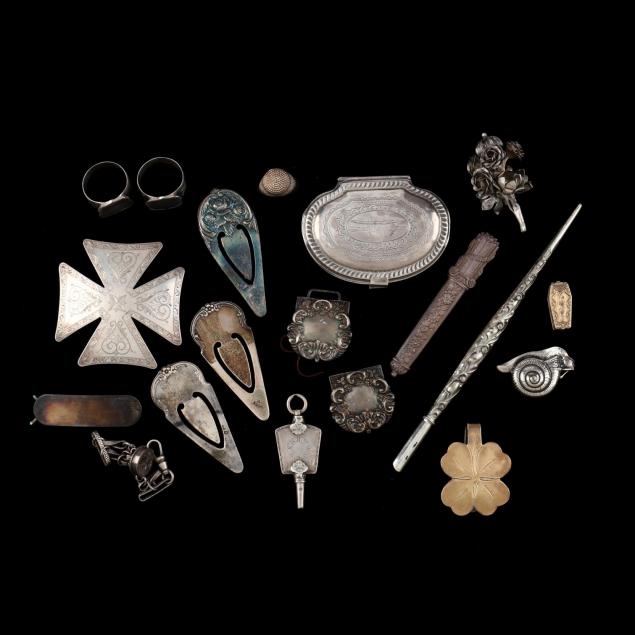 a-group-of-silver-jewelry-and-novelties