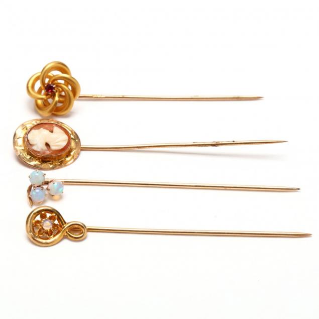 four-gold-stick-pins