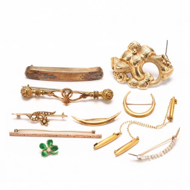 group-of-vintage-and-antique-pins-and-brooches