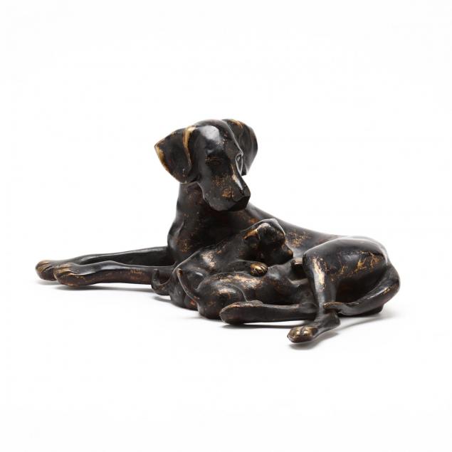 a-bronze-sculpture-of-a-setter-with-puppies