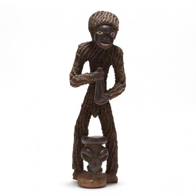 west-african-carved-wooden-male-figure-with-mallet
