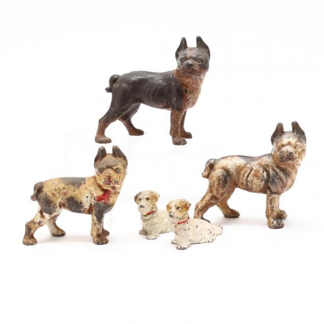five-small-vintage-cast-iron-terriers