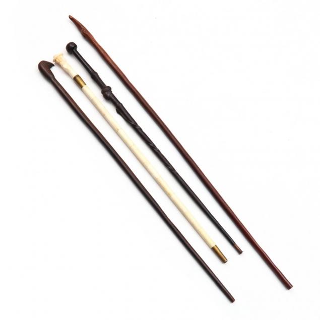 four-vintage-carved-canes