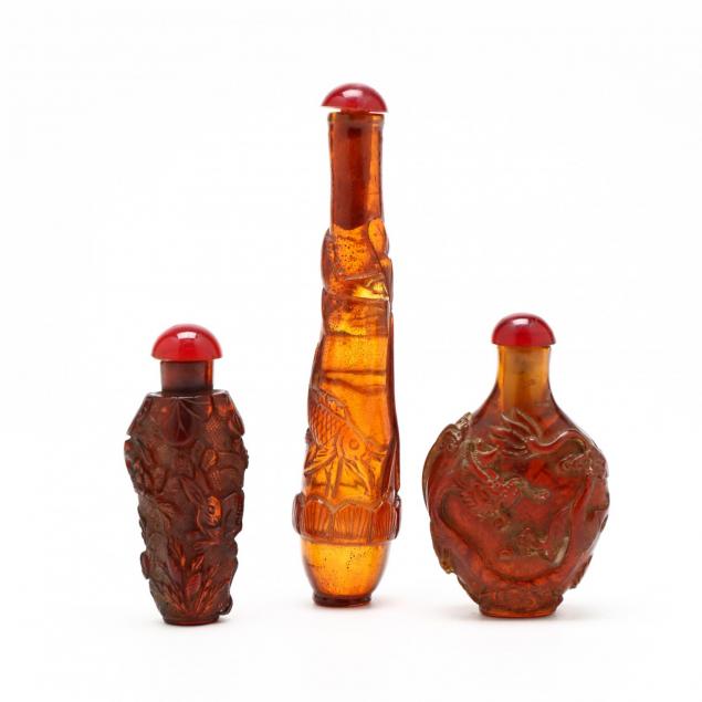 three-chinese-amber-color-snuff-bottles