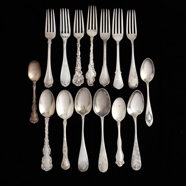 an-assembled-group-of-sterling-silver-forks-spoons