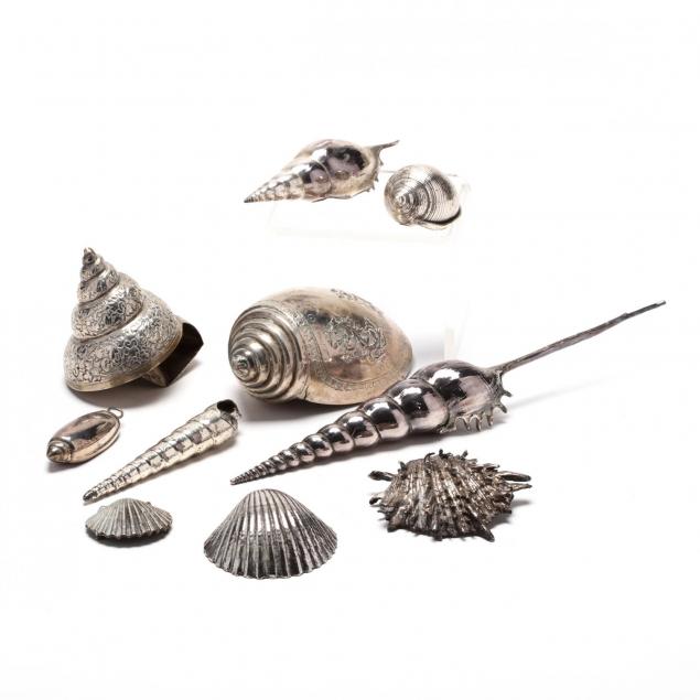 a-collection-of-ten-silver-shells