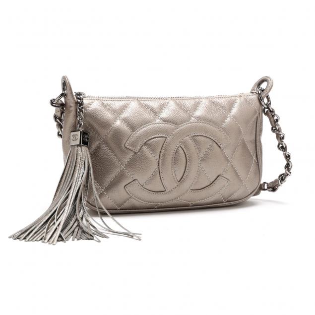 a-quilted-silver-leather-pouchette-chanel