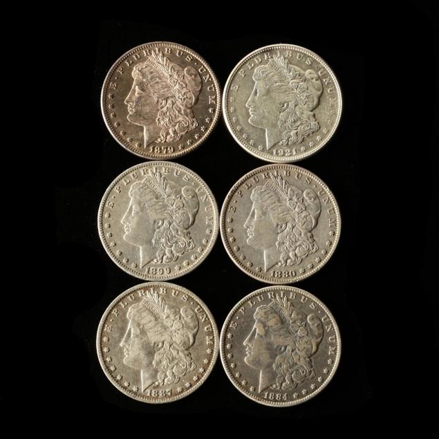 six-different-morgan-silver-dollars