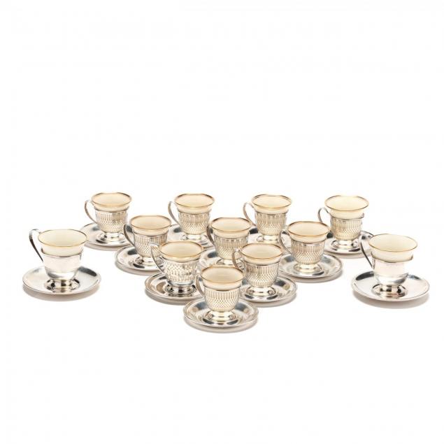 an-assembled-set-of-twelve-sterling-silver-demitasse-cups
