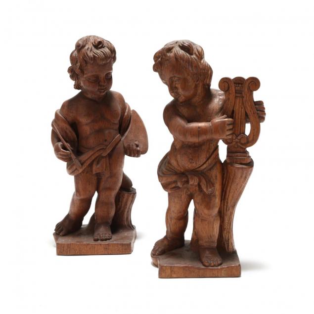 pair-of-carved-oak-putti