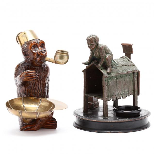 two-antique-figural-smoking-accessories