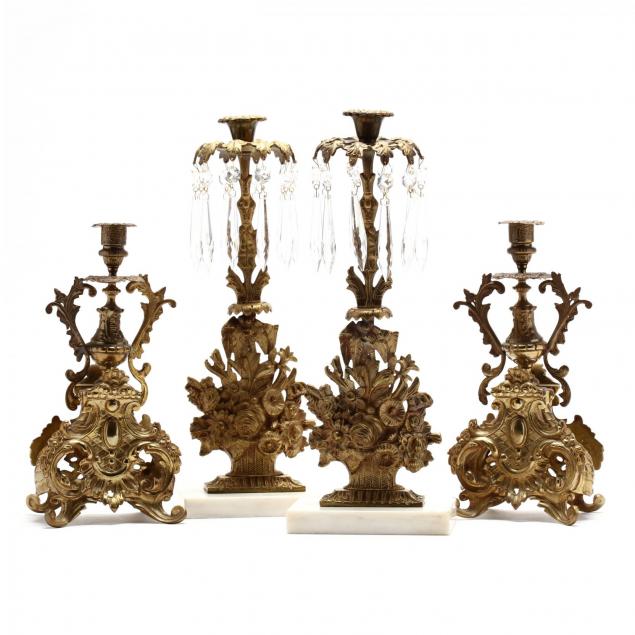 two-pair-of-classical-gilt-metal-candlesticks