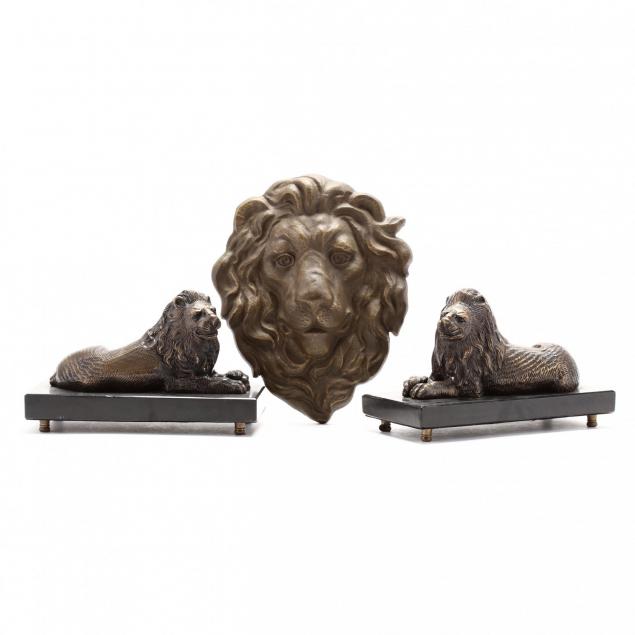 pair-of-lion-form-bookends-and-wall-mask