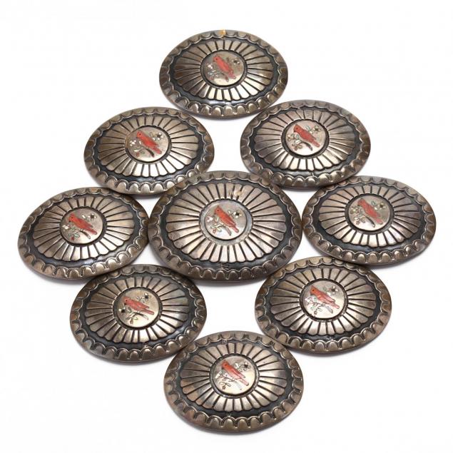 nine-southwestern-inlaid-silver-conchos