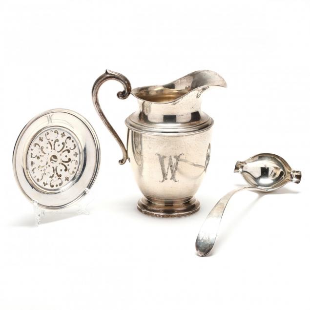 a-sterling-silver-butter-dish-soup-ladle-water-pitcher