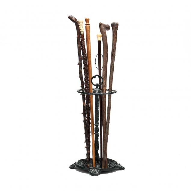 six-antique-walking-sticks-and-stand