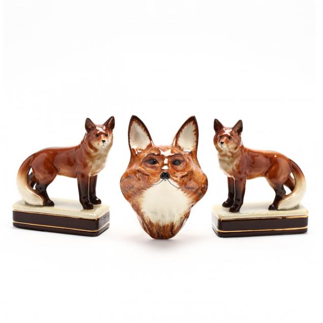 three-porcelain-fox-figures