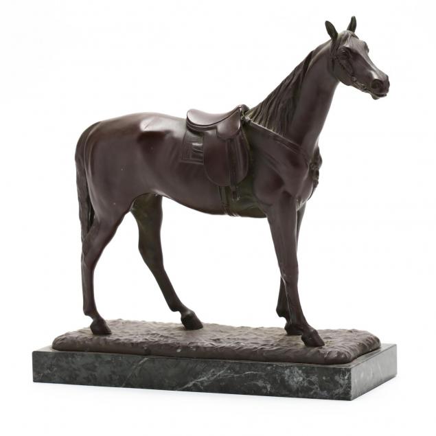 a-bronze-tone-sculpture-of-a-horse