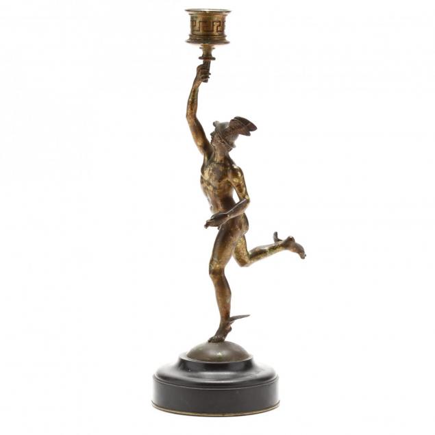 an-antique-figural-candlestick-of-mercury