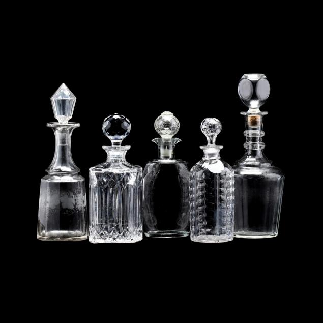 five-assorted-glass-decanters