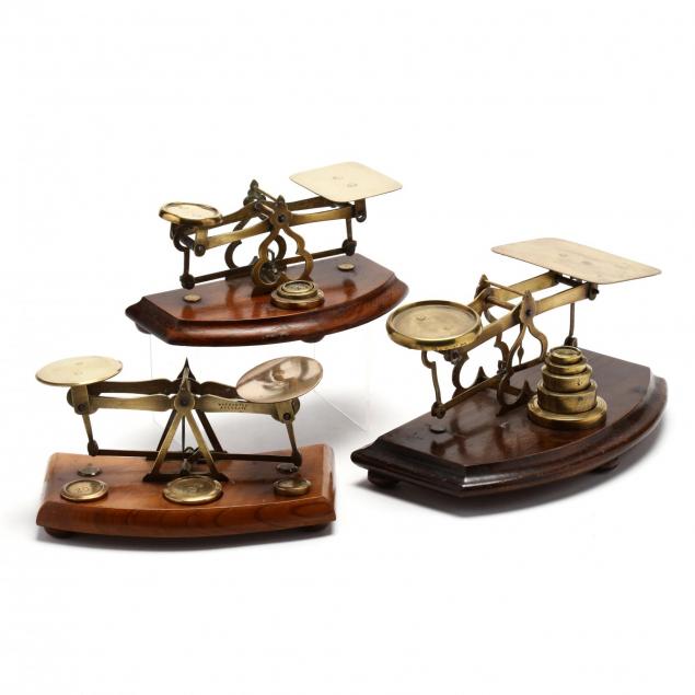 three-small-british-postal-scales-with-weights