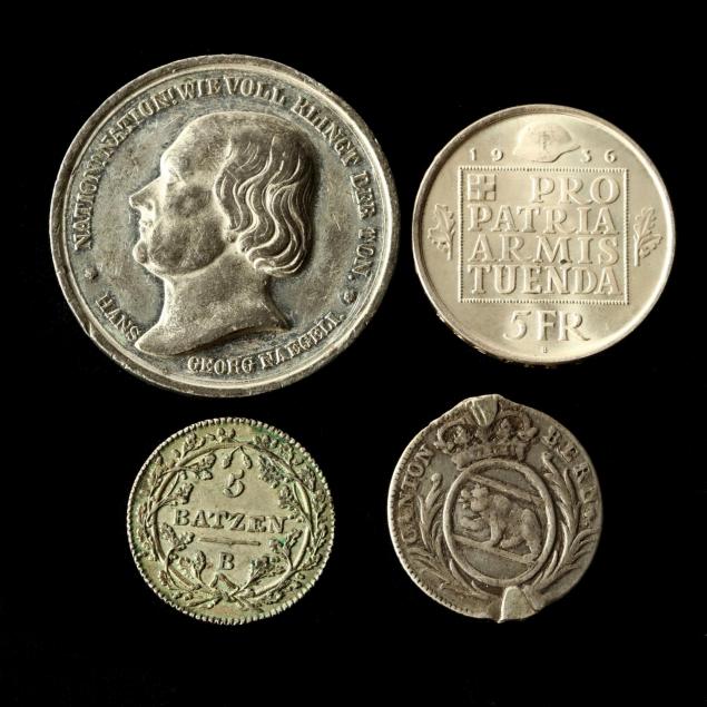 three-swiss-silver-coins-and-a-medallion