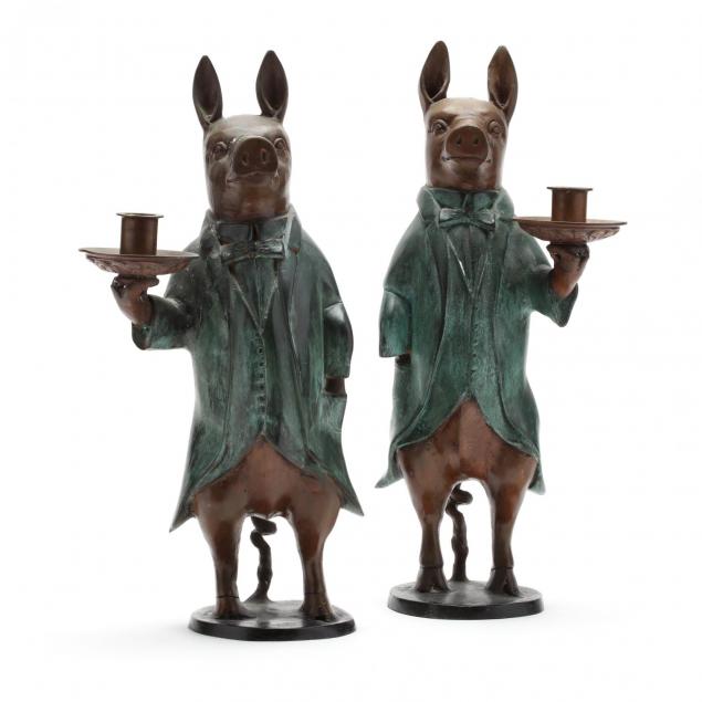 pair-of-bronze-butler-pig-candlesticks