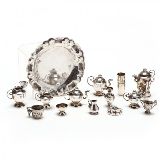 a-group-of-vintage-silver-miniatures