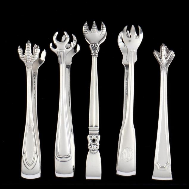five-sterling-silver-tongs