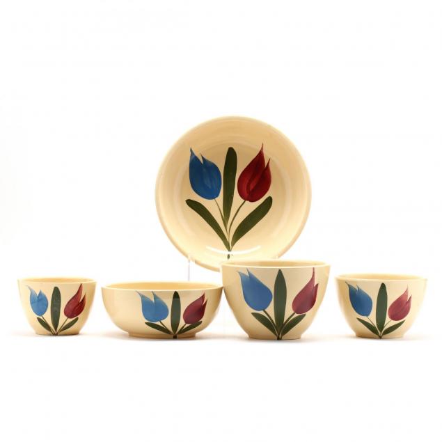 a-group-of-watt-pottery-bow-tulip-pattern