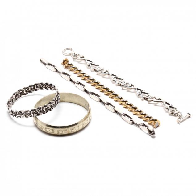 five-silver-bracelets