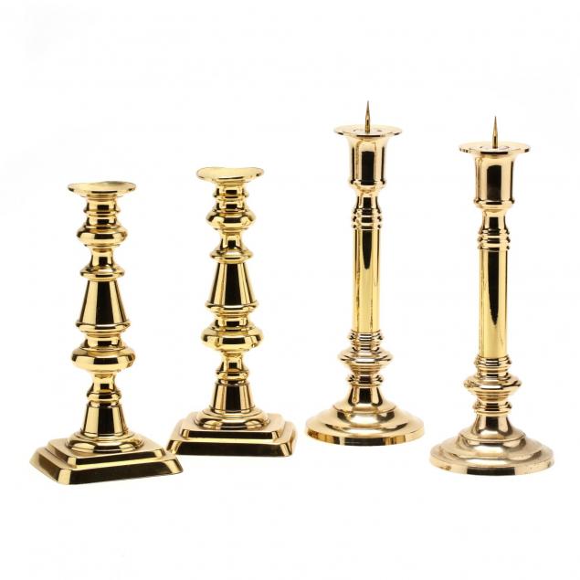 two-pairs-of-brass-candlesticks