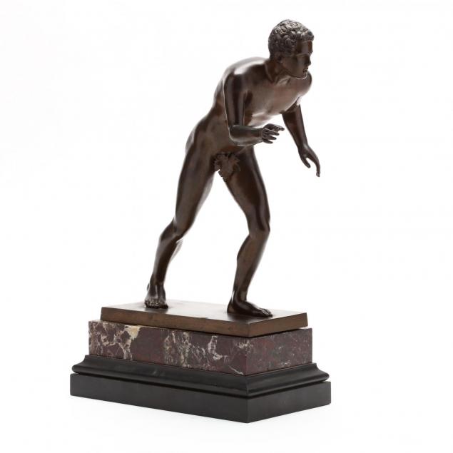 a-bronze-statue-of-an-athlete-after-the-antique