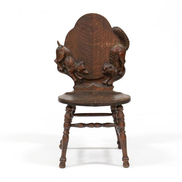 whimsical-carved-oak-tavern-chair