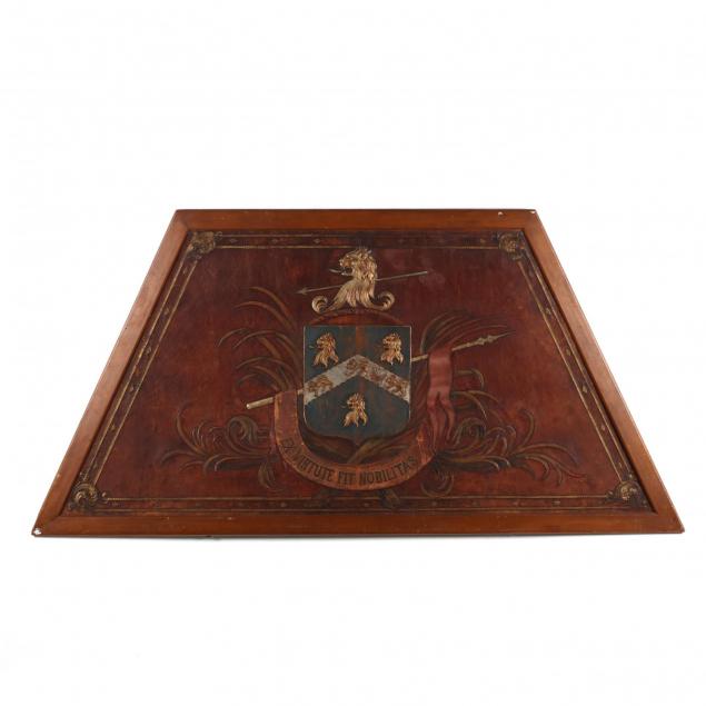 an-antique-heraldic-wall-hanging-with-coat-of-arms