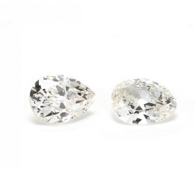 two-unmounted-old-pear-cut-diamonds